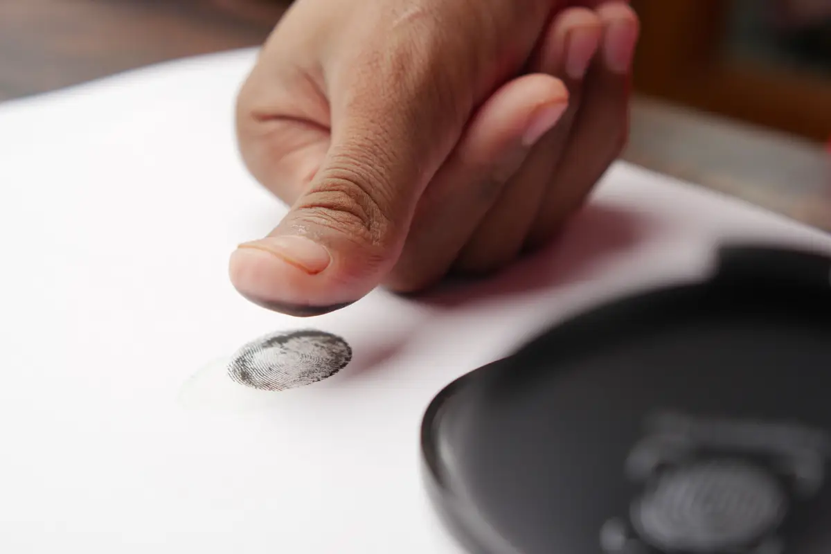 a person making a fingerpint